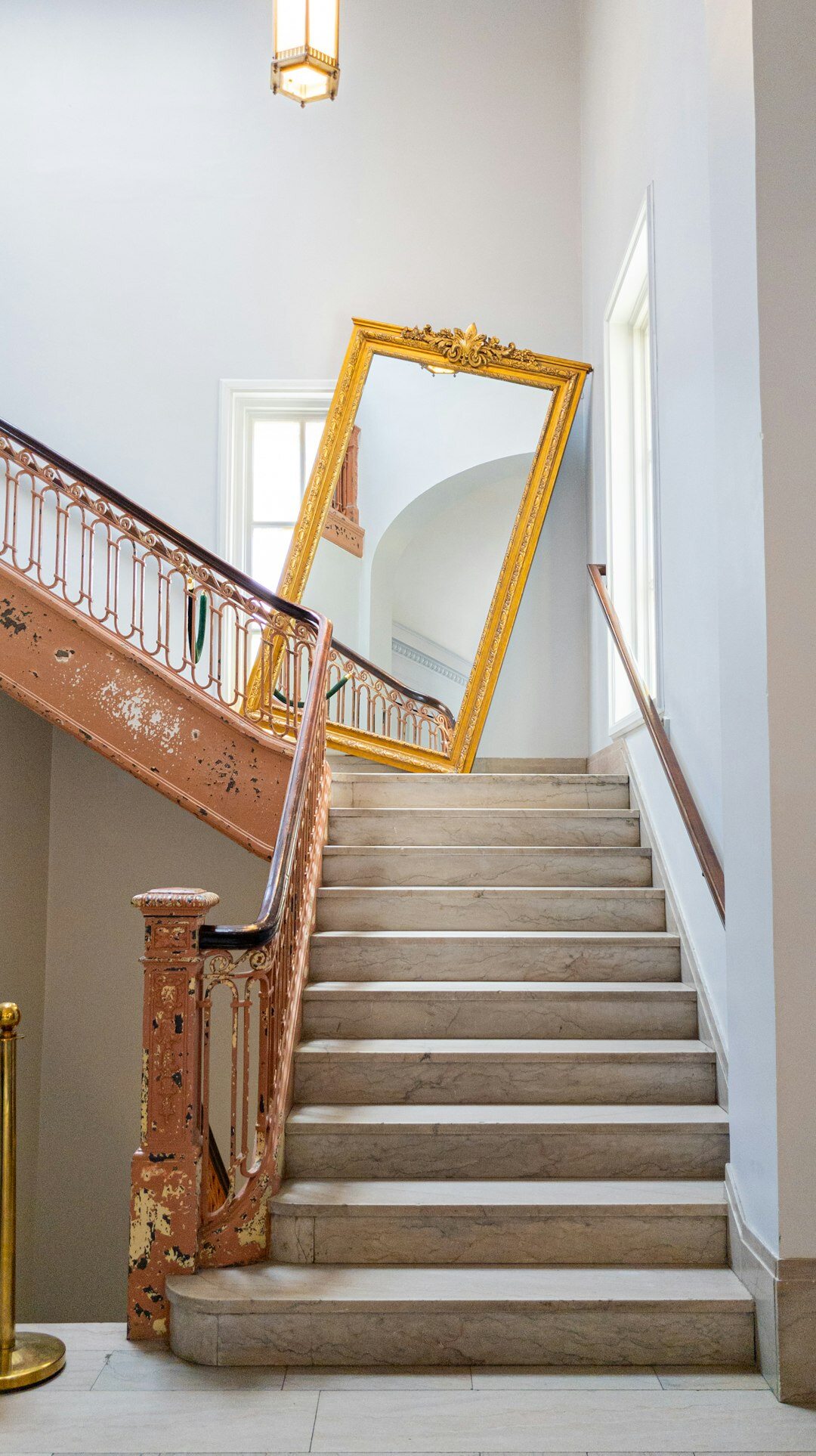 gold framed mirror wall