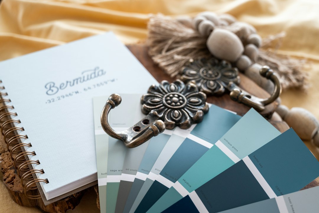 Stylish magazine editorial desk with mood boards and fabric swatches
